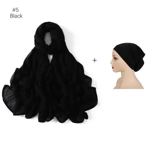 Ensemble long foulard en modal noir et bonnet assorti, montrant texture et style.