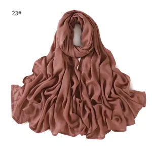 Detailed view of solid color crinkle hijab, lightweight and breathable fabric texture.