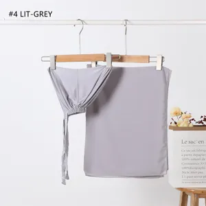 Detail view of light grey modal inner cap and chiffon hijab scarf set, soft drape.