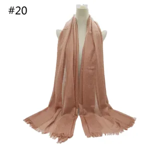 Solid color breathable cotton blend shawl scarf with short tassels, elegant detail view.