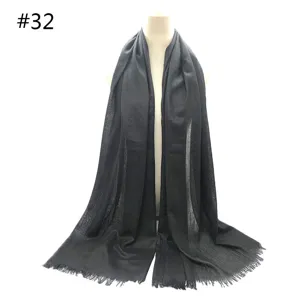 Classic black solid color cotton blend scarf with fringed edges, breathable and versatile.