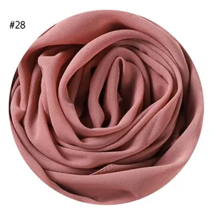 Einfarbiges Perl-Chiffon Hijab Tuch in Rosé, elegante Bläschen-Textur, leicht und luftig.