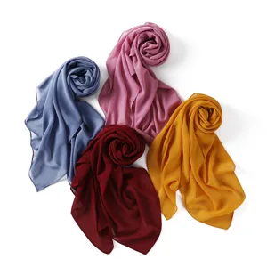 Solid color chiffon square scarf detail shot, breathable thin hijab and summer sun shawl.
