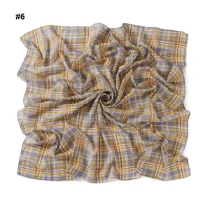 Detail view of the retro plaid print chiffon square scarf, elegant accessory for women.