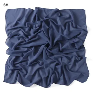 Detailed texture view of solid color chiffon square scarf, lightweight breathable fabric drape.