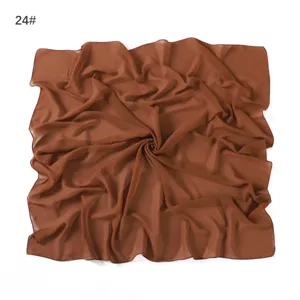 Chiffon square scarf detail, lightweight breathable solid color fabric texture close up.