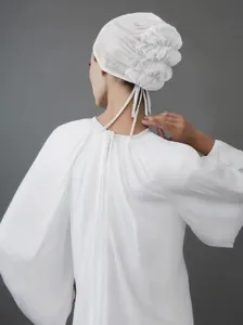 White breathable mesh inner cap, solid color elastic tie-up adjustable hijab cap detail.