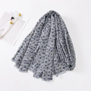 Detailed view of women cotton linen scarf with blue shell print and fringe edge elegant shawl.