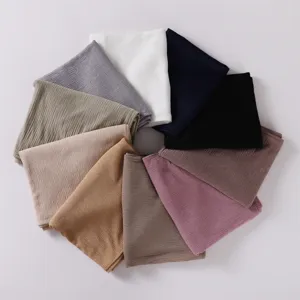 Solid color elastic pleated hijab scarf, breathable crinkle jersey head wrap, detailed texture.
