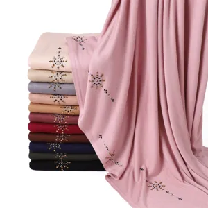 Stretchy breathable solid mercerized cotton hijab with sparkling rhinestone ice flower motif.