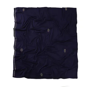 Detail view of dark blue mercerized cotton scarf featuring shimmering rhinestone lines.