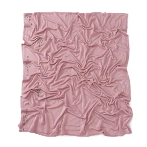 Pink mercerized cotton jersey hijab shawl featuring sparkling rhinestone details on edge.