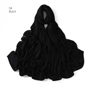 Detailed view of the black pleated stretchy jersey hijab scarf, soft breathable texture.