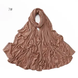 Detailed view of the brown rhinestone embellished stretch mercerized cotton hijab scarf.