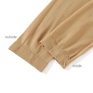 Vue détaillée des manchons anti-UV unicolores, accessoires de protection solaire femme.