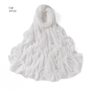White pleated stretch jersey hijab detail, breathable crinkle Muslim scarf texture close up.