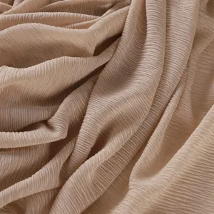 Solid color elastic breathable crinkled jersey hijab scarf for women, comfortable daily wear.
