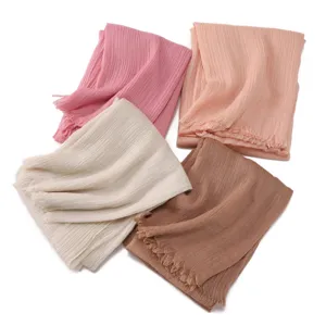 Solid color crinkled long scarf with tassels, soft breathable shawl for daily wear.