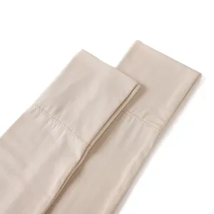 Manches de protection solaire en coton modal doux pour femmes, couleur nude détails.
