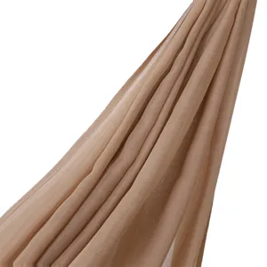 Close-up view of lightweight breathable solid color modal scarf fabric with soft texture.