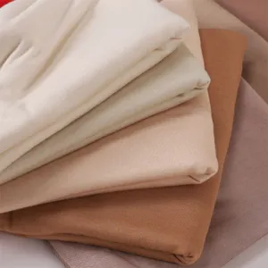 Soft modal jersey scarf fabric detail, breathable solid color folded textile material.