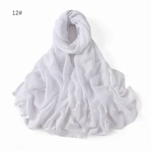 Detailed view of solid white modal breathable hijab shawl, lightweight soft cotton scarf.