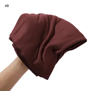 Close-up view of the soft cotton jersey modal scarf detail, showing breathable fabric texture.