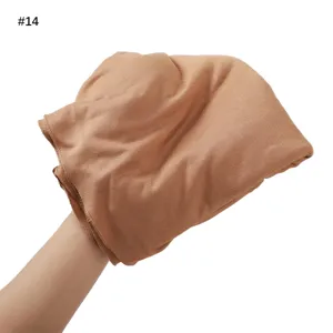 Detailed view of solid color soft cotton modal hijab scarf folded nicely on white background.