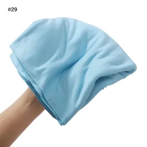 Soft blue jersey headscarf detail, breathable modal cotton fabric texture close up view.
