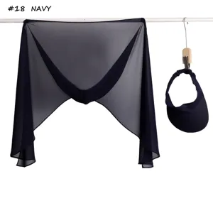 Detail shot of navy blue pearl chiffon hijab and matching sun visor hat set hanging.