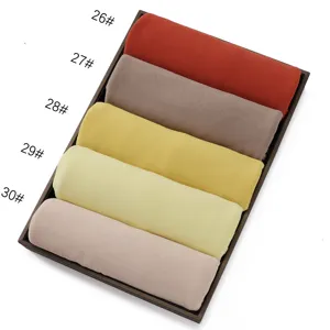 Solid color modal long scarf fabric roll detail display showing multiple color variants.