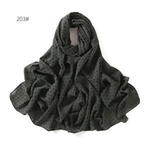 Dark green chiffon hijab scarf with diamond dot print for women long head wrap styling.