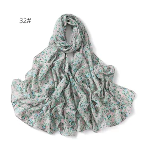 Chiffon floral printed scarf detail, lightweight breathable sun protection accessory.