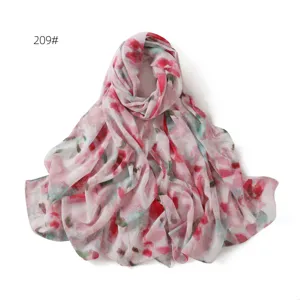 Detailed view of the pink floral printed chiffon scarf, lightweight and soft fabric.