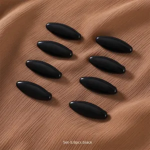 Detail view of 8pcs black oval hijab pins anti-glare scarf clips neatly arranged.