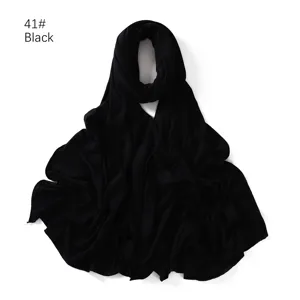 Solid color modal long scarf hijab, black jersey fabric detail view, versatile fashion accessory.