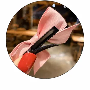 Bonita pinza de pelo con lazo rosa para niñas, hermoso accesorio para el cabello infantil.