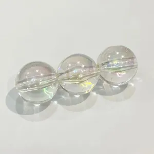 Close-up of clear AB iridescent acrylic round beads detail for DIY jewelry making