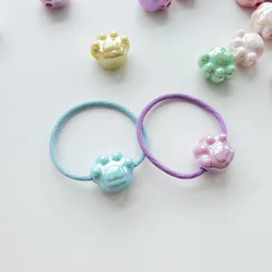 Cute cat paw hair ties with colorful acrylic charms and elastic bands for daily styling.