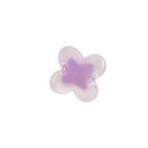 Transparent acrylic four-leaf clover charm bead with purple inner core and AB rainbow finish.