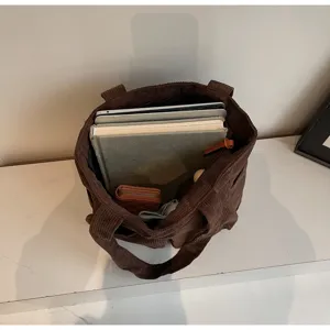 Large capacity brown corduroy tote bag showing interior space, ideal for commuting and daily use.