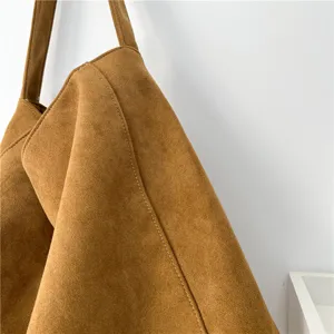 Brown suede tote bag for women, minimalist large capacity shoulder bag, retro style daily use.