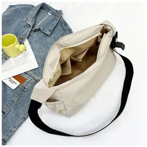 Casual nylon crossbody bag for women, large capacity multi-compartment shoulder commuter bag.