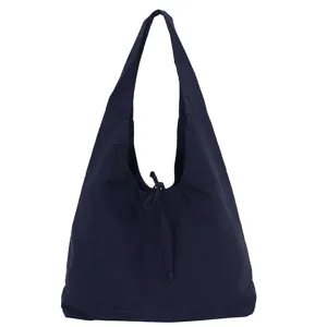 Detailed view of the dark blue fabric shoulder tote bag with cute bow detail and large capacity.