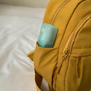 Stylish lightweight nylon small backpack for women, casual commuter bookbag with pockets.