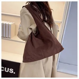 Bruine suède slouchy schoudertas voor dames, grote casual shopper tas voor dagelijks pendelen.