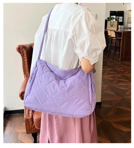Spacious purple quilted nylon tote bag, versatile casual shoulder crossbody bag for women.