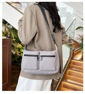 Grey multi-pocket nylon shoulder bag for women, casual daily crossbody bag commute style.