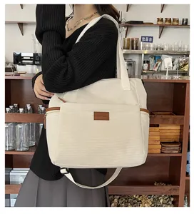 Large capacity corduroy tote bag for women, stylish single shoulder and crossbody casual handbag.