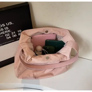 Minimalist pink nylon tote bag for women, lightweight casual daily shoulder bag commuter handbag.